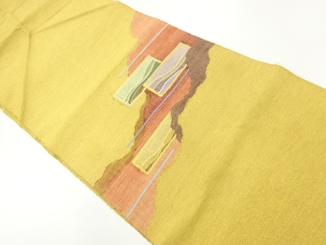 金通し　道長取に流水模様織出し　名古屋帯